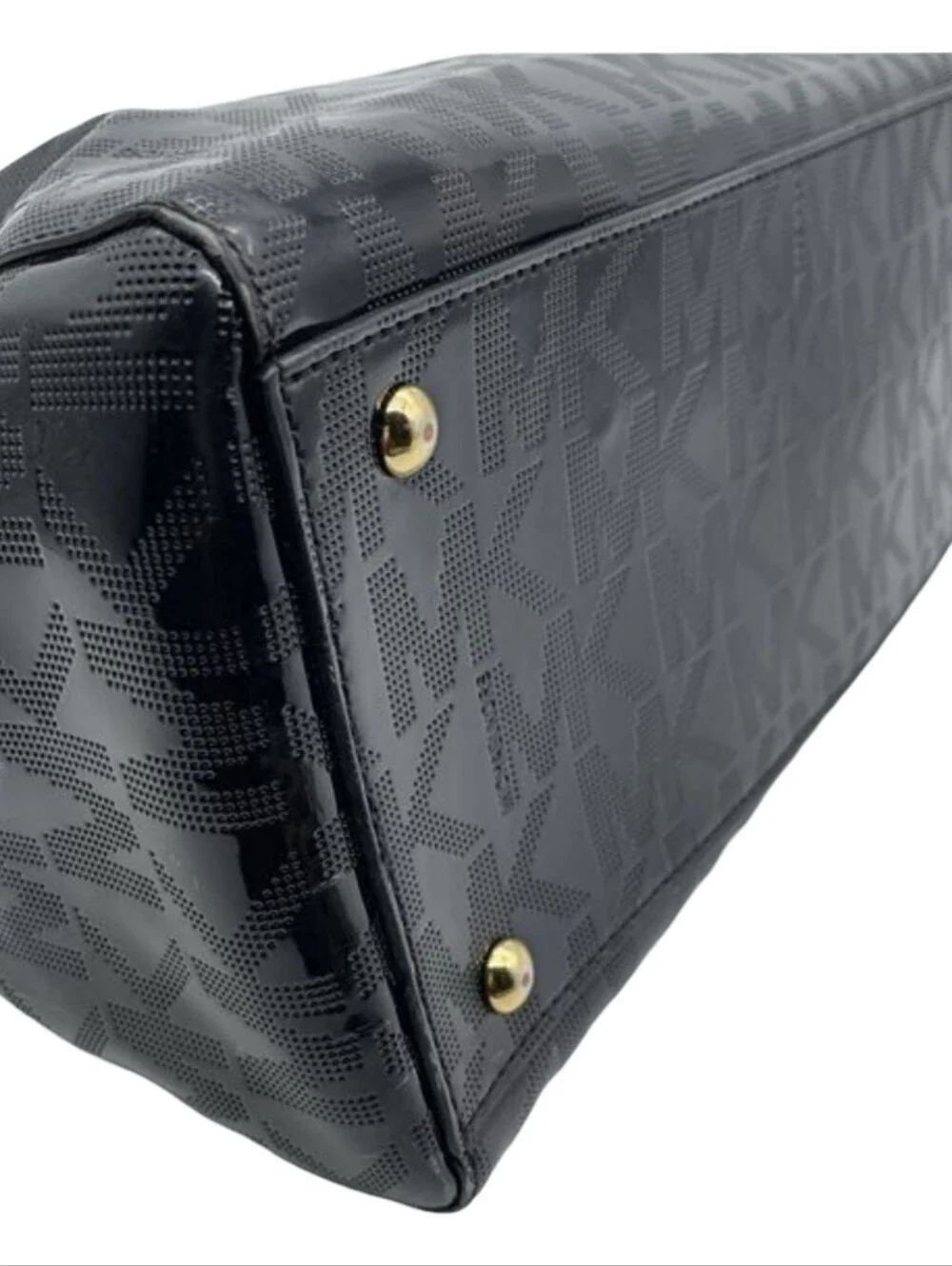 Michael Kors Jet Set satchel black patent leather with the embossed MK logo